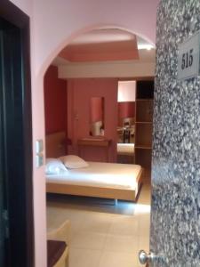 Posteľ alebo postele v izbe v ubytovaní Hotel Niki Piraeus