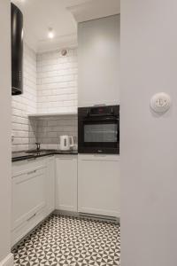 Una cocina o cocineta en Rytm miasta