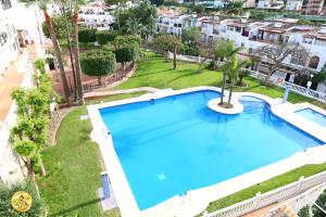 an overhead view of a large swimming pool at a apartment at A4J Luxury in Mijas