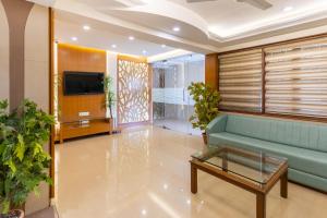 TV a/nebo společenská místnost v ubytování Hotel Prime