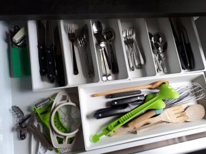 a drawer filled with lots of kitchen utensils at Ca' Santina in Cittadella