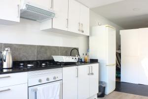 Kuchyň nebo kuchyňský kout v ubytování Gypsy Budget Room Shared Flat