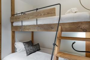 Un ou plusieurs lits dans un hébergement de l'établissement Appartement Sifflote - LES CHALETS COVAREL