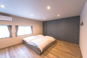 A bed or beds in a room at 香季庵Euphoria