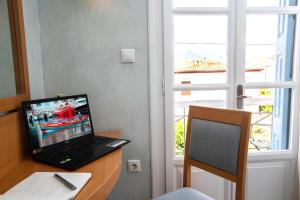 TV a/nebo společenská místnost v ubytování Hotel Argo