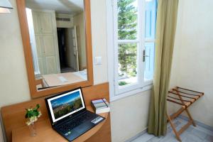 TV a/nebo společenská místnost v ubytování Hotel Argo