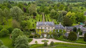 an aerial view of a large house with a garden at Market Place Cottage, Tetbury, Cotswolds Grade II Central location in Tetbury