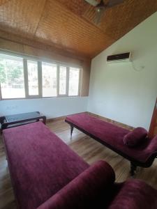 Posezení v ubytování Sherly Cottages