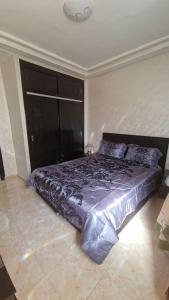 Cama ou camas em um quarto em Spacieux appartement au centre-ville de Tanger