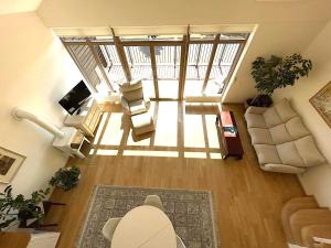 an overhead view of a living room with furniture at The best apartment in Trakai! Retreat! Rejuvenate! Rent with Ease! in Trakai