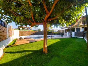 En have udenfor MORERA BLANCA piscina, barbacoa, chill-out