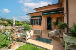 Κήπος έξω από το Residenza Menta e Rosmarino