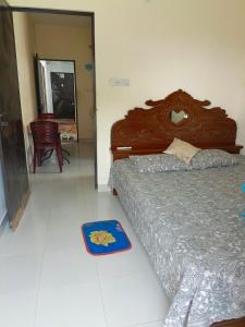 A bed or beds in a room at Star Night stay family Studio AC Apartment