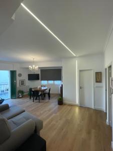 a living room with a couch and a table at Campo de la Compañía in Monforte de Lemos