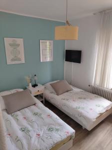 Ліжко або ліжка в номері Guesthouse in Weeze