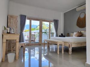 Postel nebo postele na pokoji v ubytování Bali Diversity Dive Resort