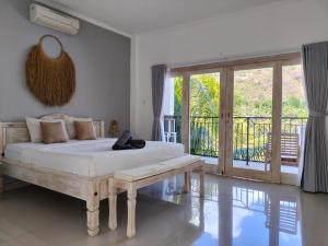 Postel nebo postele na pokoji v ubytování Bali Diversity Dive Resort + 86 fotografií