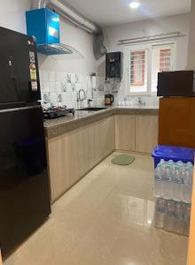 Kuchyň nebo kuchyňský kout v ubytování Stayat47Rajgarh