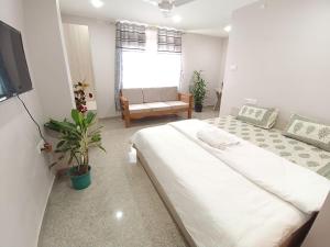 Postel nebo postele na pokoji v ubytování Stayat47Rajgarh + 4 fotografie