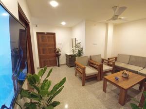 TV a/nebo společenská místnost v ubytování Stayat47Rajgarh