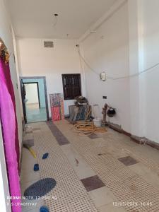 a room being remodeled with a tile floor at Kailash home in Deoghar