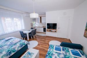 a living room with a couch and a table at Apartman Neca Trebinje in Trebinje