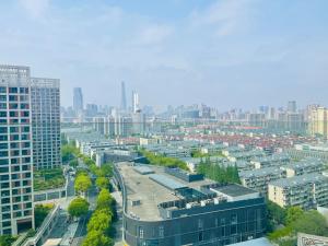 an aerial view of a city with tall buildings at Atour S Hotel Shanghai Lujiazui Expo Center in Shanghai