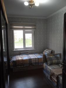 Krevet ili kreveti u jedinici u objektu Уютная Квартира