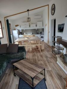 a living room with a couch and a table at A Pieve in Vico