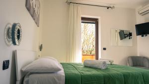 Кровать или кровати в номере VILLA Vigne Vecchie