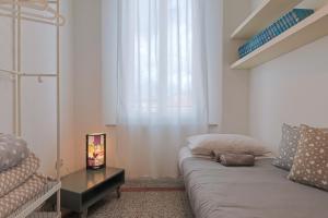 Postel nebo postele na pokoji v ubytování B&B Cristina e Stefano