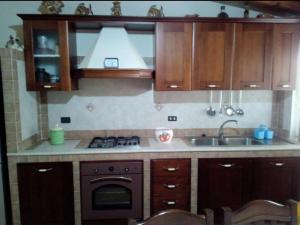 Kuchyň nebo kuchyňský kout v ubytování Lampedusa da Sogno 1 + 5 fotografií