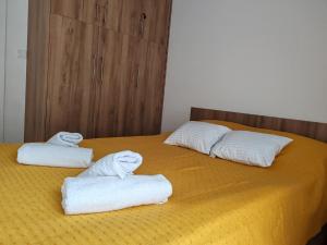 Katil atau katil-katil dalam bilik di Angelika apartman Divčigora