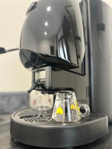 a coffee maker sitting on top of a counter at Pina's house in Pianillo