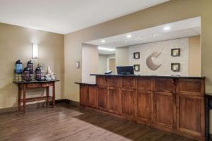 a hospital room with a reception desk and a pharmacyacistacistacistacist at Comfort Inn Fort Morgan in Fort Morgan