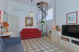 TV a/nebo společenská místnost v ubytování B&B Cristina e Stefano