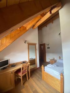 Letto o letti in una camera di Hotel Aplis