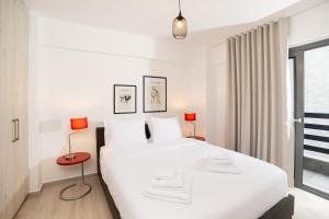 Postel nebo postele na pokoji v ubytování Velvet Luxury Apartments in the City Center by BiNoBi!