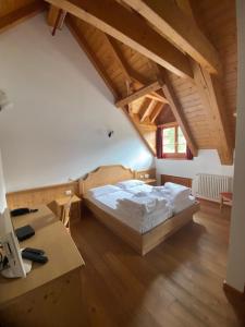 Letto o letti in una camera di Hotel Aplis