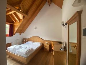 Letto o letti in una camera di Hotel Aplis