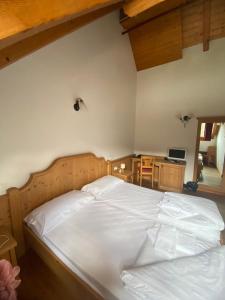 Letto o letti in una camera di Hotel Aplis
