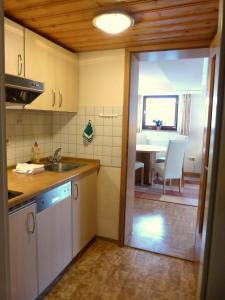 Kuchyň nebo kuchyňský kout v ubytování Ferienwohnung Vier Jahreszeiten