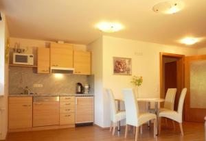 Kuchyň nebo kuchyňský kout v ubytování Ferienwohnung Vier Jahreszeiten