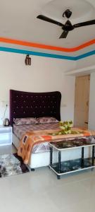 Postel nebo postele na pokoji v ubytování Snowdrop inn coorg