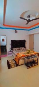 Postel nebo postele na pokoji v ubytování Snowdrop inn coorg