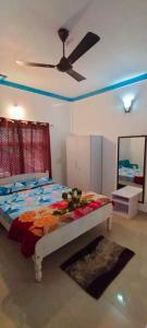 Postel nebo postele na pokoji v ubytování Snowdrop inn coorg