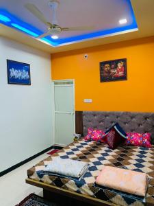 Postel nebo postele na pokoji v ubytování Manjushree Guest House