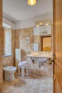 Koupelna v ubytování Relais La Fattoria