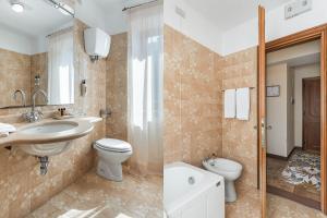 Koupelna v ubytování Relais La Fattoria