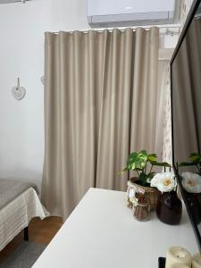 A bed or beds in a room at ORTIGIA 26